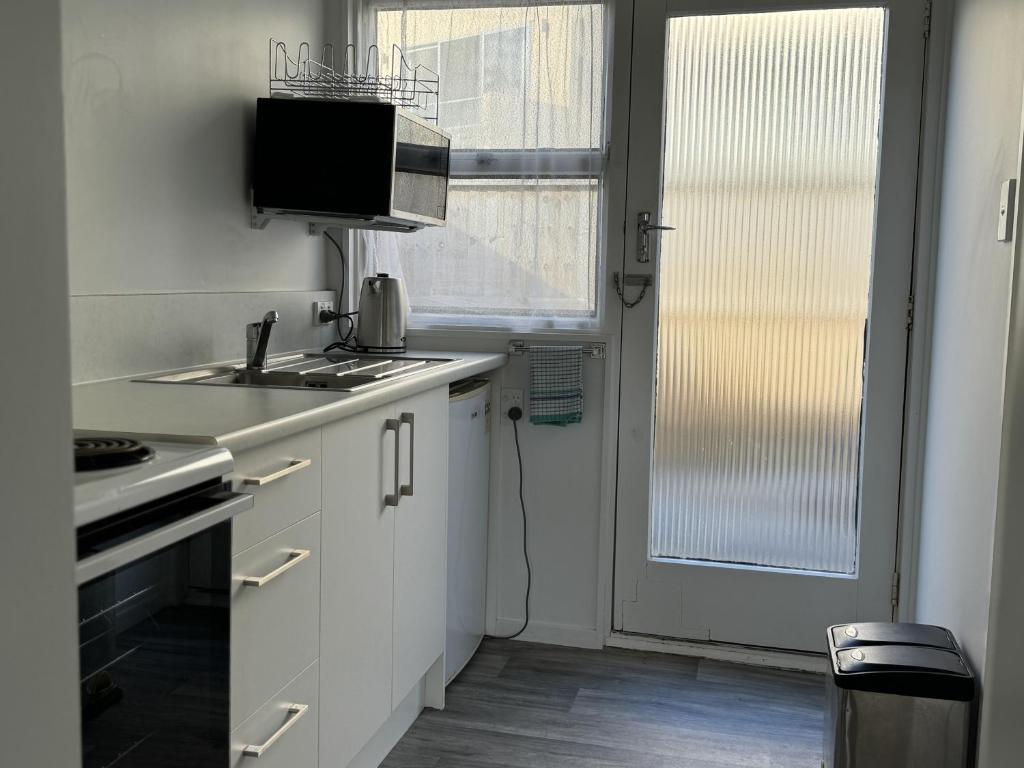 Kuchyň nebo kuchyňský kout v ubytování Diplomat Motel