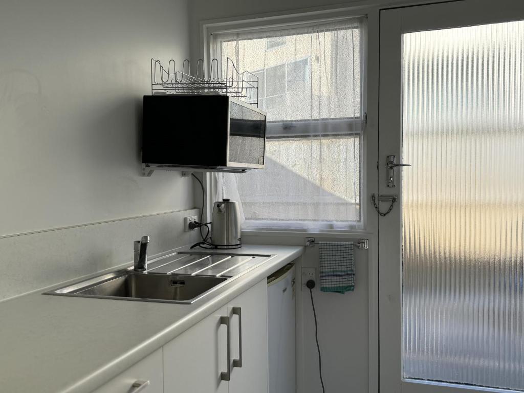 Kuchyň nebo kuchyňský kout v ubytování Diplomat Motel