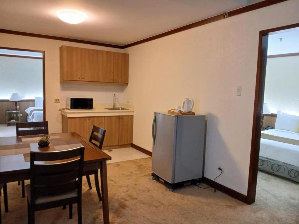 Kuchyň nebo kuchyňský kout v ubytování Dohera Hotel