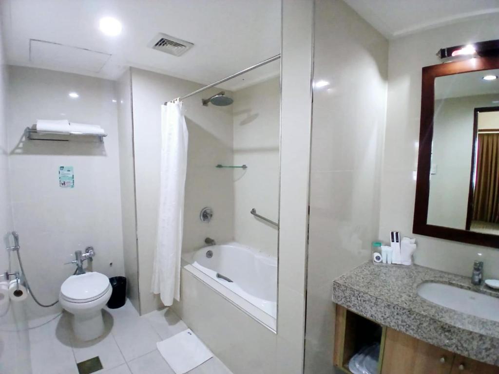 Koupelna v ubytování Dohera Hotel