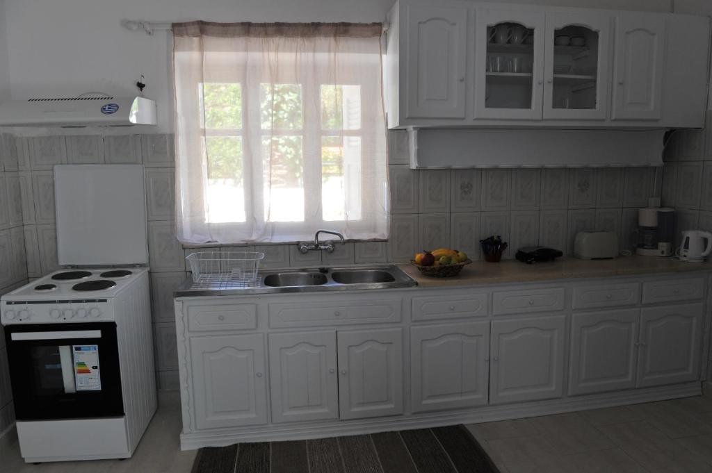 Kuchyň nebo kuchyňský kout v ubytování Kalymnos residence