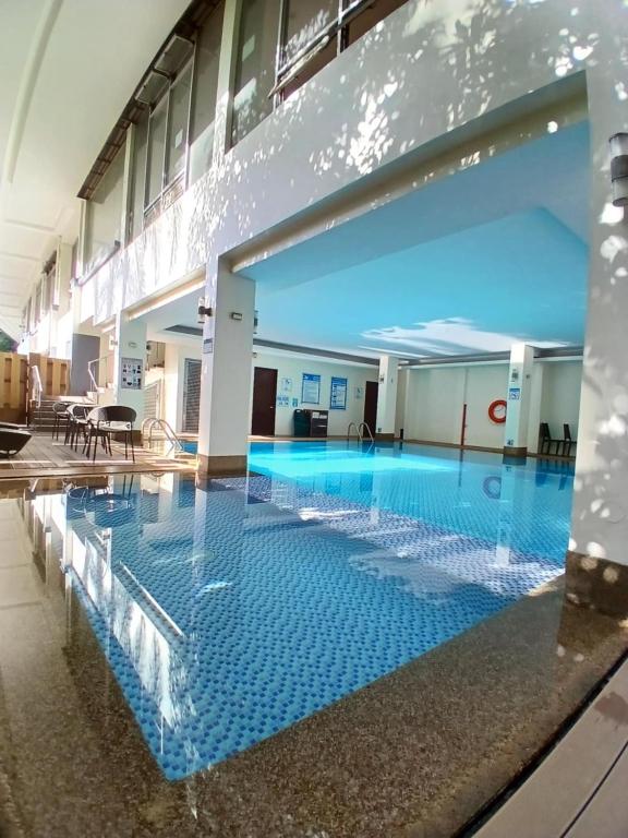 Bazén v ubytování Dohera Hotel nebo v jeho okolí