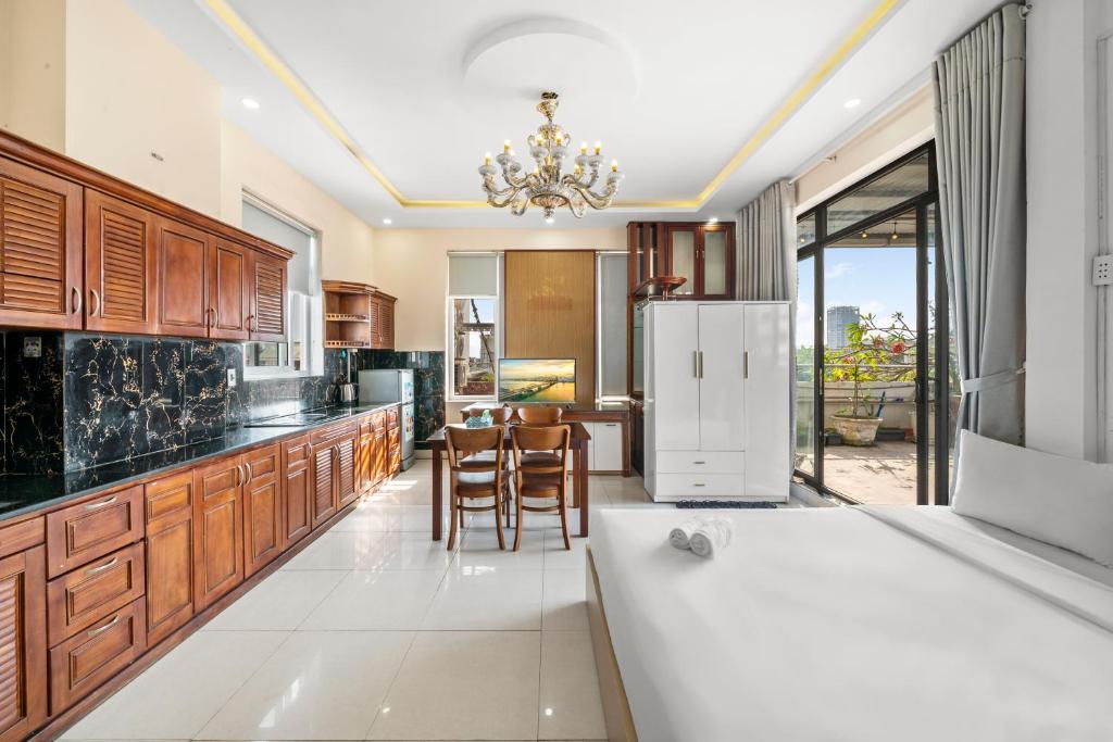 Kuchyň nebo kuchyňský kout v ubytování Kis Hotel & Apartment