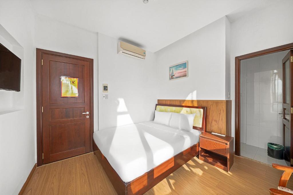Postel nebo postele na pokoji v ubytování Kis Hotel & Apartment