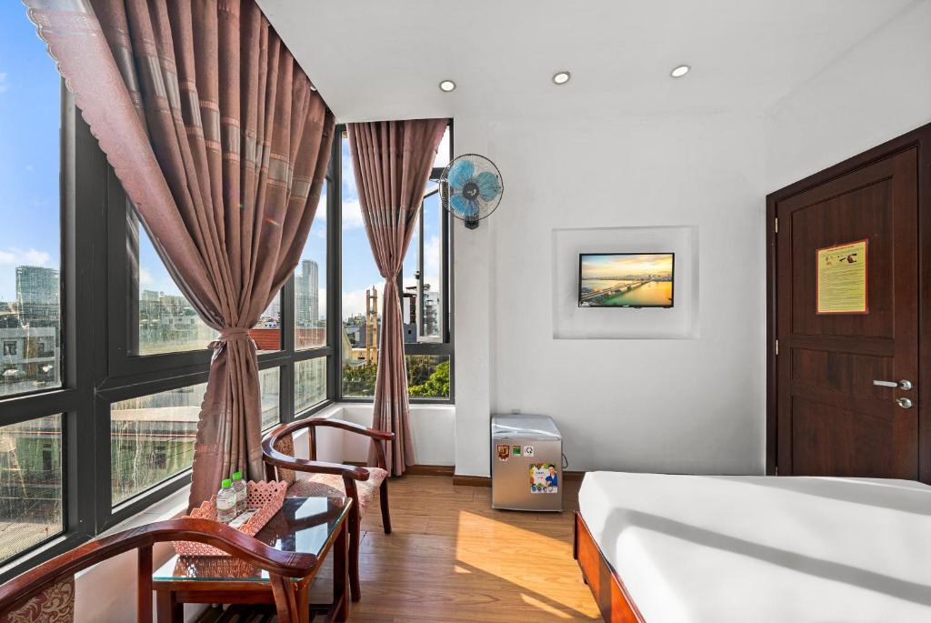 Postel nebo postele na pokoji v ubytování Kis Hotel & Apartment