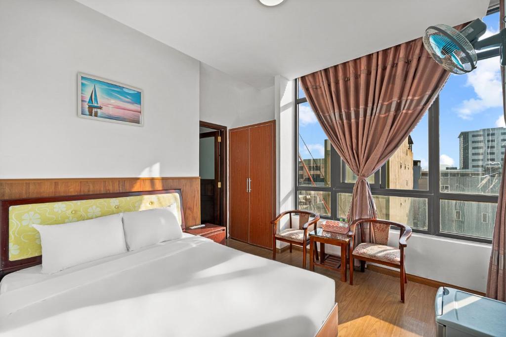 Postel nebo postele na pokoji v ubytování Kis Hotel & Apartment
