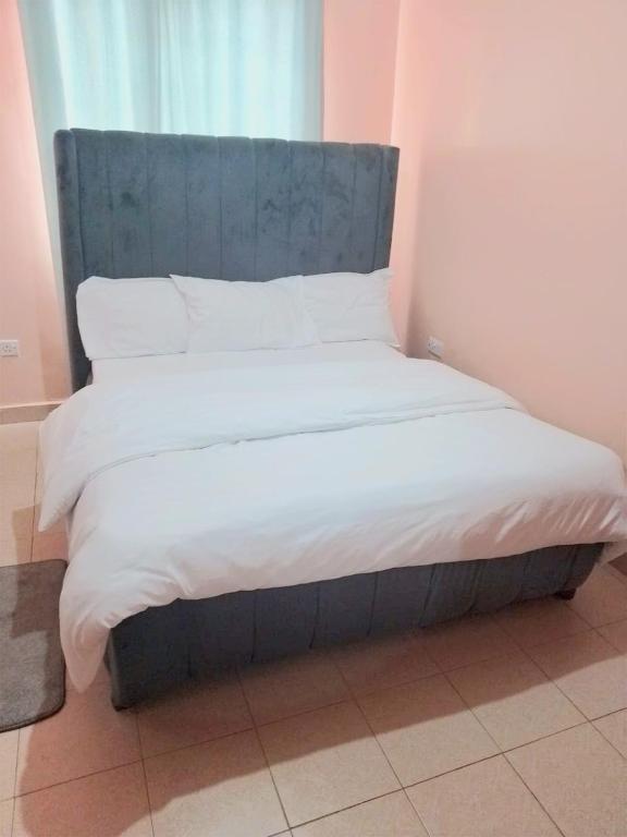 Postel nebo postele na pokoji v ubytování stylerhome