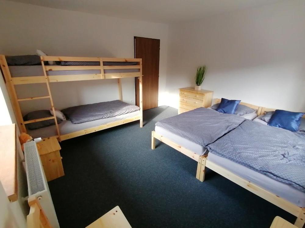 Postel nebo postele na pokoji v ubytování Pension MEJTO