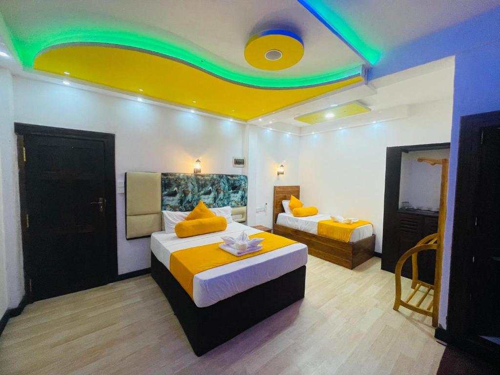 Postel nebo postele na pokoji v ubytování Wilroma Hotel&Resort