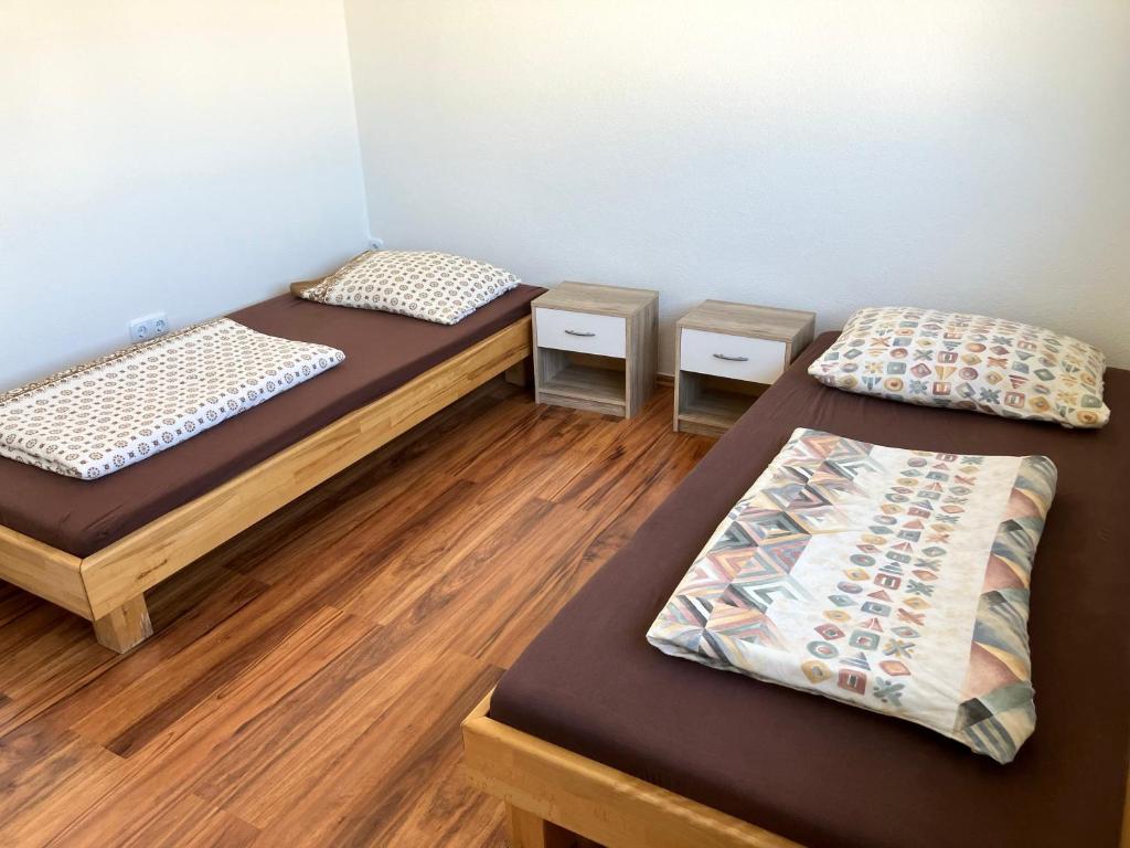 Postel nebo postele na pokoji v ubytování Zum Handwerkerglück Günzburg