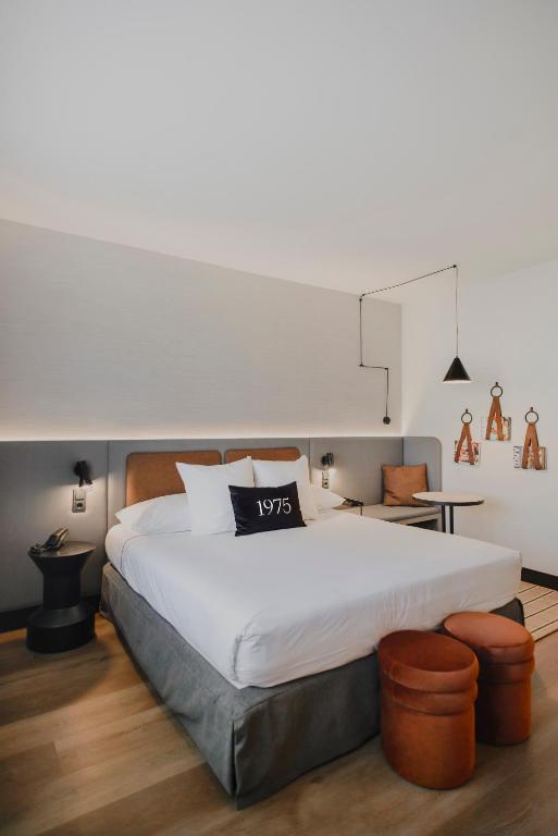 Postel nebo postele na pokoji v ubytování Hotel Dimar