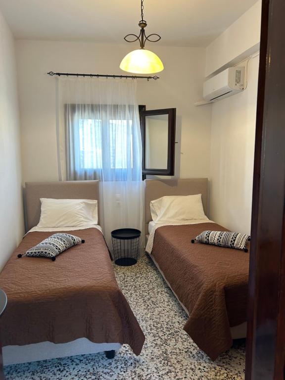 Posteľ alebo postele v izbe v ubytovaní Old Town Villa