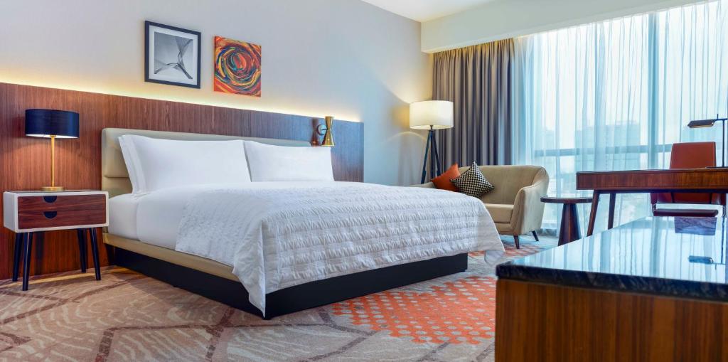 Postel nebo postele na pokoji v ubytování Le Meridien Putrajaya