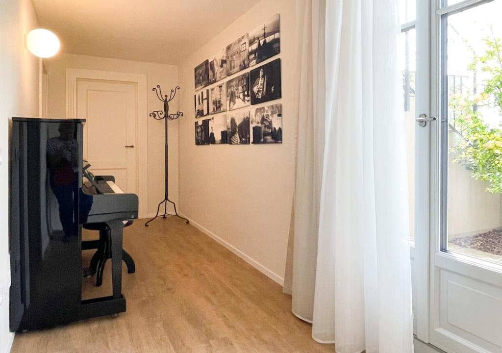 TV a/nebo společenská místnost v ubytování Millefiori Apartment