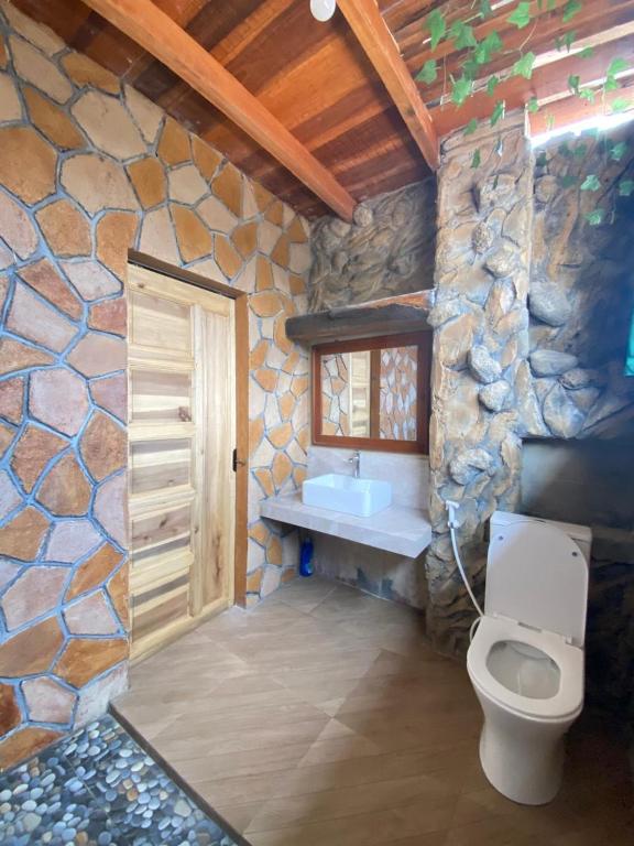 Postel nebo postele na pokoji v ubytování ADA Homestay