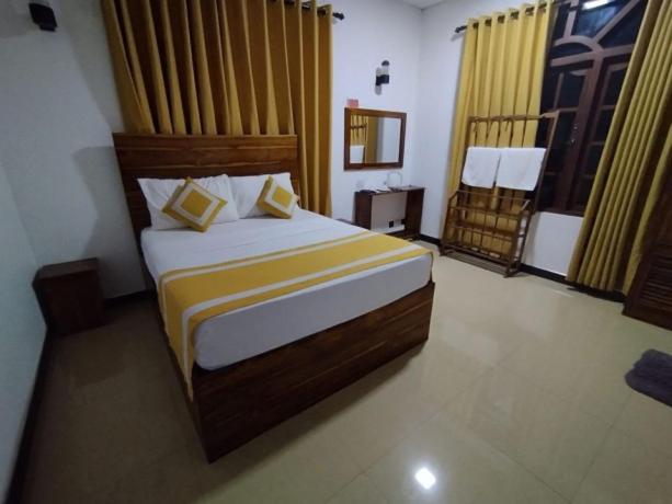 Postel nebo postele na pokoji v ubytování Wilroma Hotel&Resort
