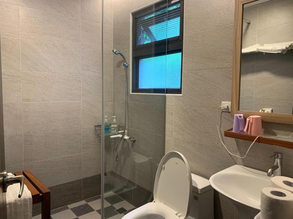 Koupelna v ubytování Jiang's B&B 江院子庭園民宿