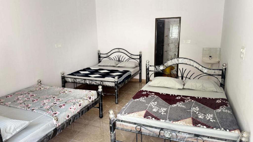 Postel nebo postele na pokoji v ubytování StayIn-SGH
