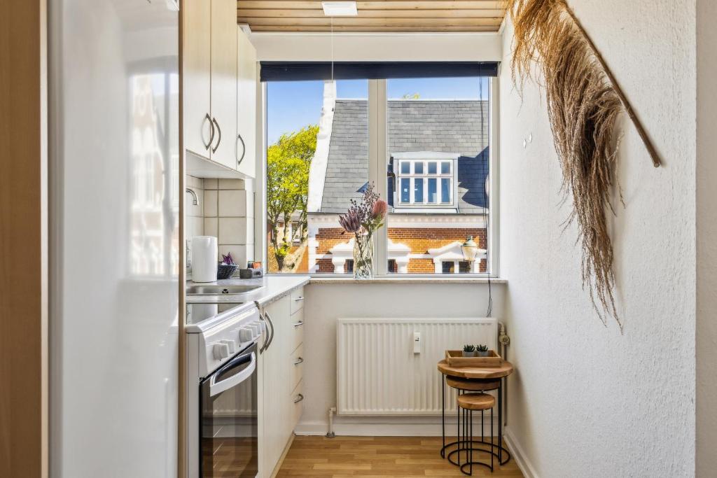 Kuchyň nebo kuchyňský kout v ubytování Hotel Ringkøbing