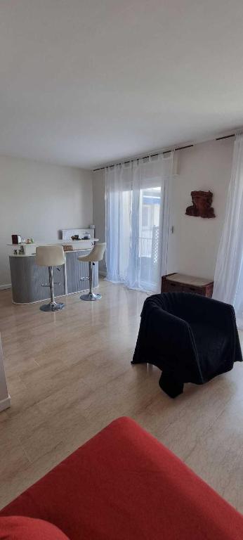 Posezení v ubytování Chez Denis-Jo Chambres d'hôtes