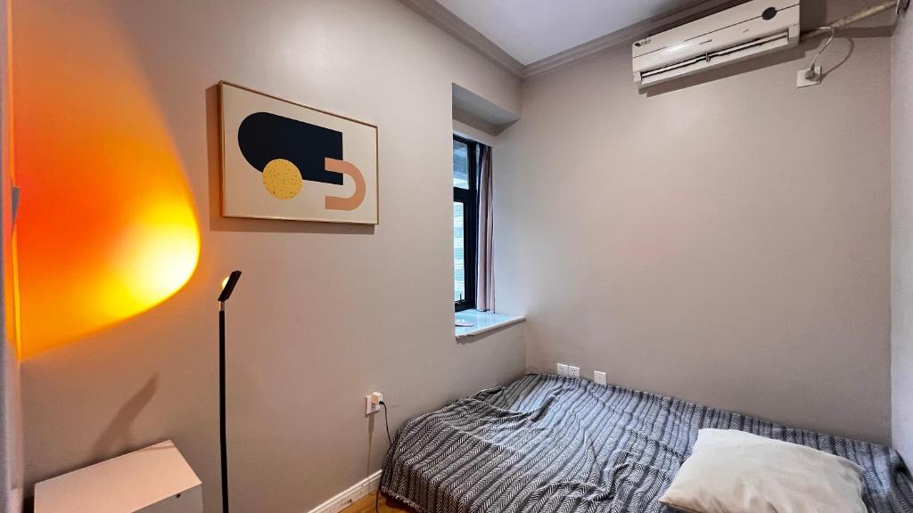 Voodi või voodid majutusasutuse Duowei Executive Apartment Changsha Branch Wuyi Square Branch toas