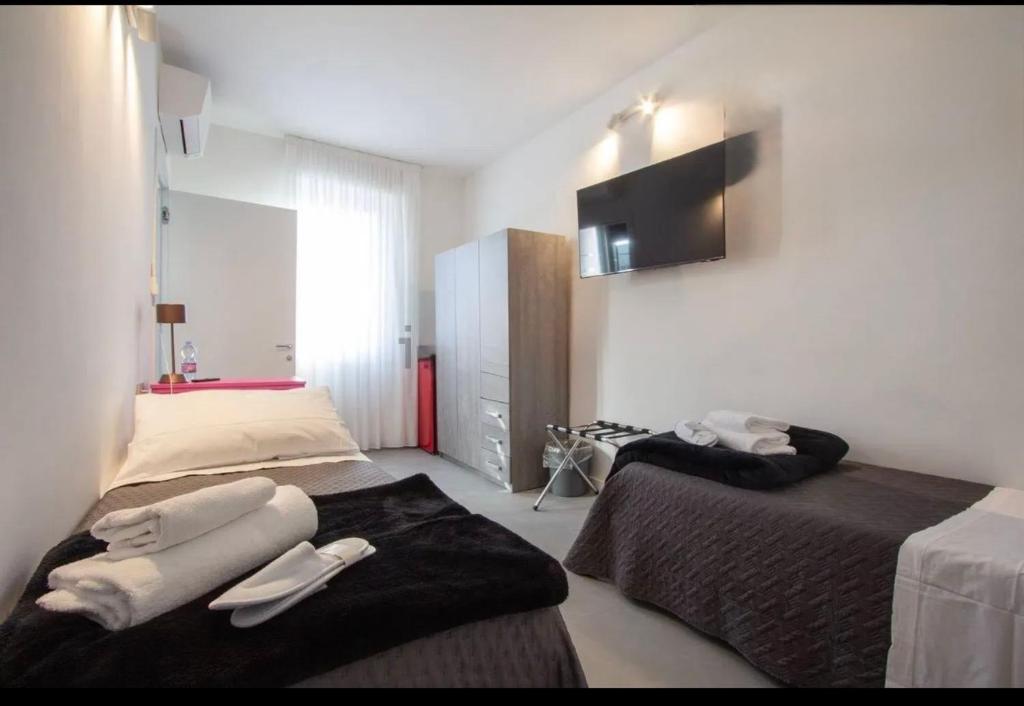 Postel nebo postele na pokoji v ubytování B&B Relax Rooms - Villa Segala
