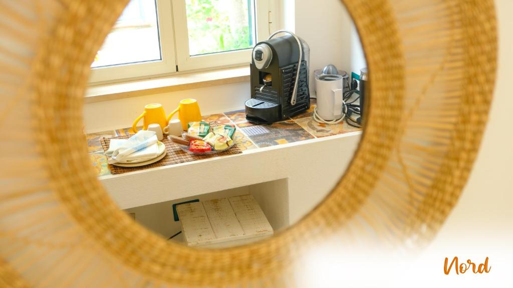 Příslušenství pro přípravu čaje a kávy v ubytování Le Dimore - Charme Rooms
