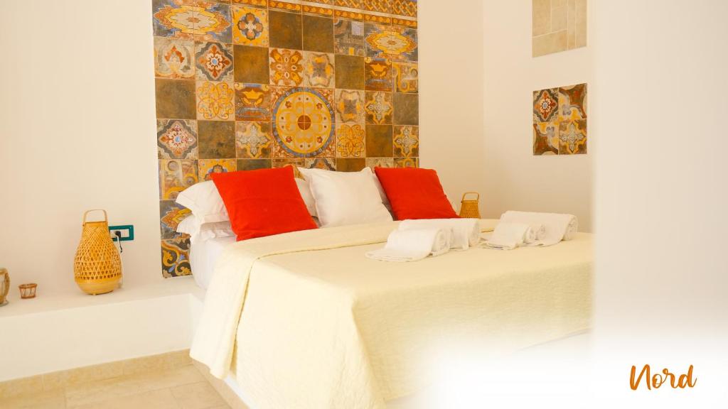 Postel nebo postele na pokoji v ubytování Le Dimore - Charme Rooms