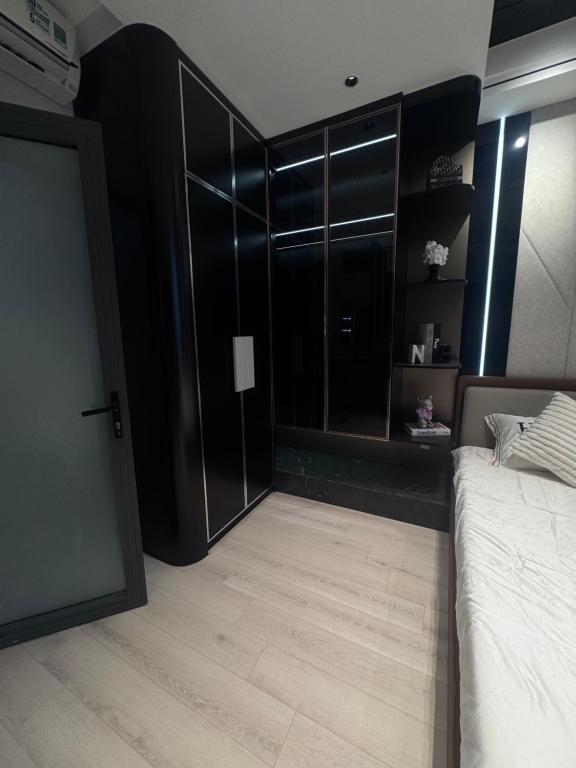 Postel nebo postele na pokoji v ubytování Chani Home