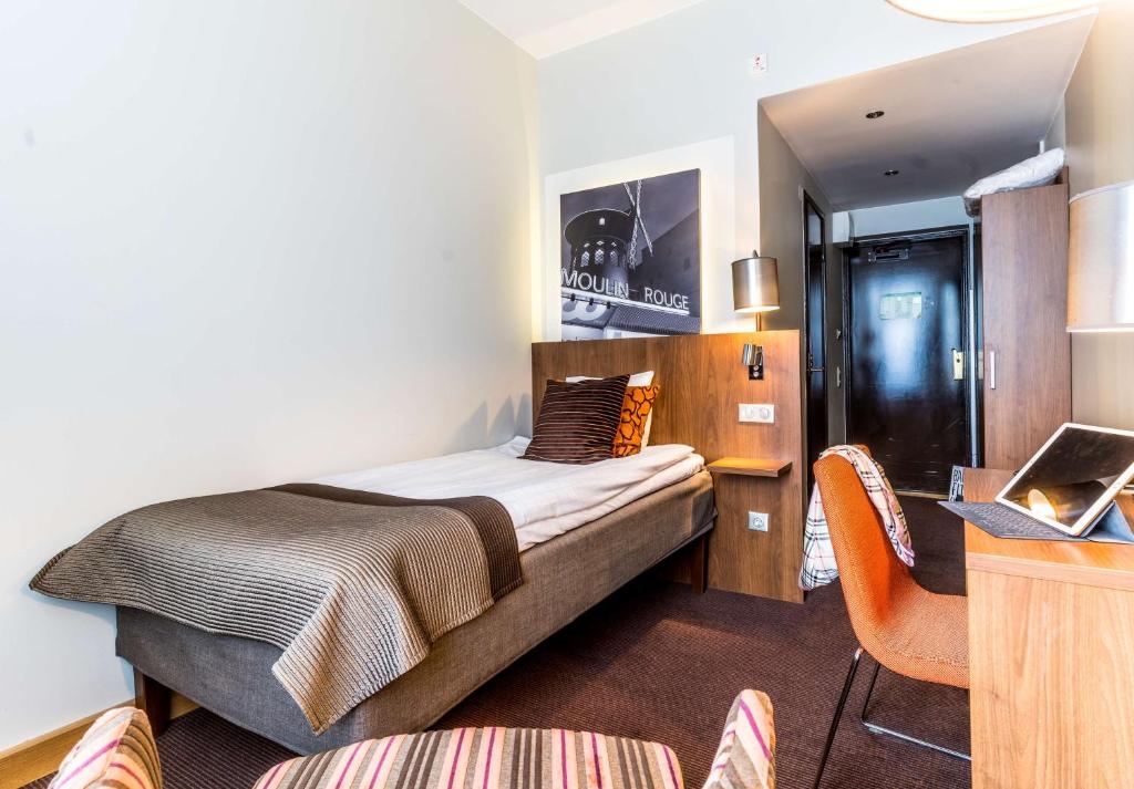 Postel nebo postele na pokoji v ubytování Scandic Stora Hotellet