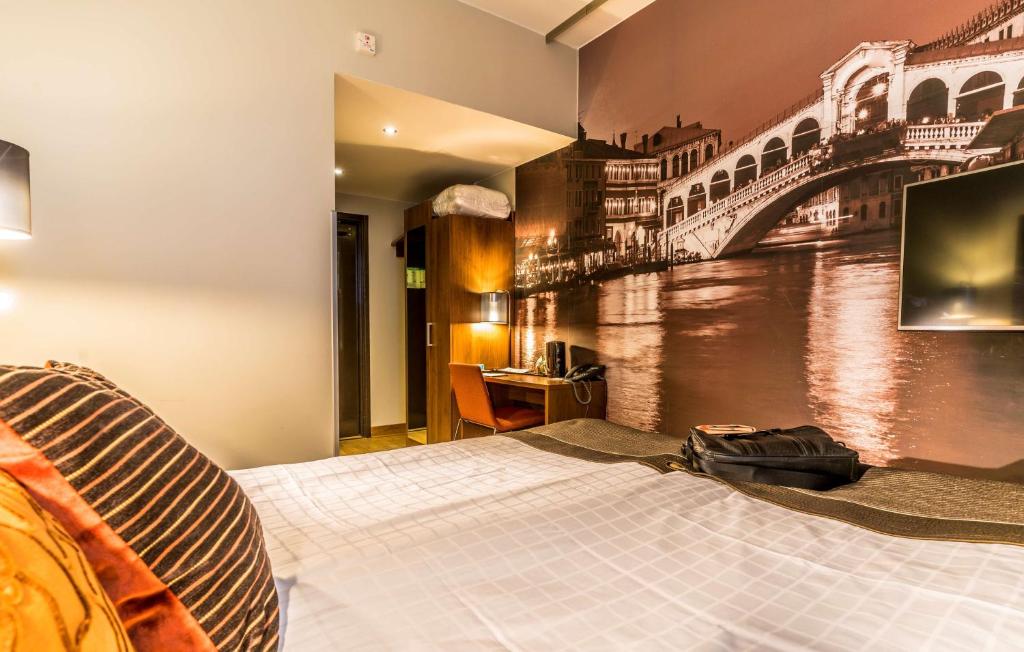 Postel nebo postele na pokoji v ubytování Scandic Stora Hotellet