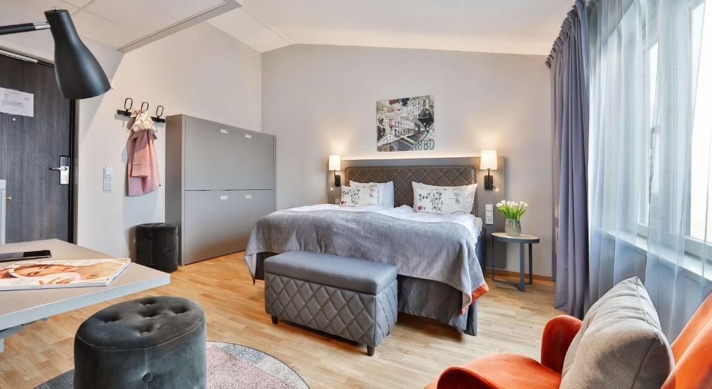 Postel nebo postele na pokoji v ubytování Scandic Stora Hotellet