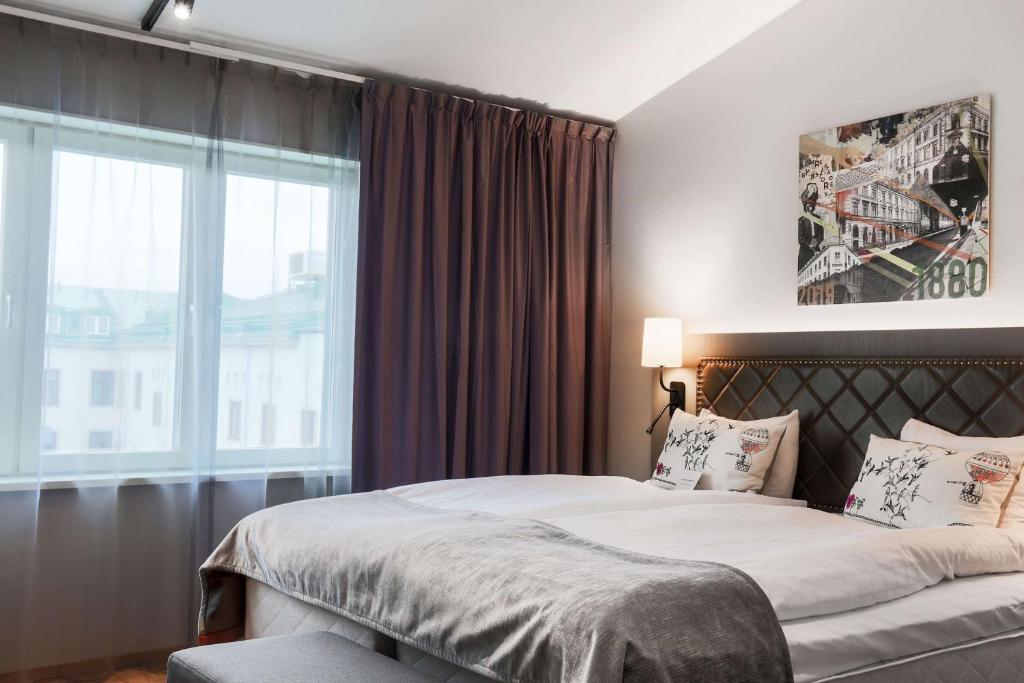Postel nebo postele na pokoji v ubytování Scandic Stora Hotellet