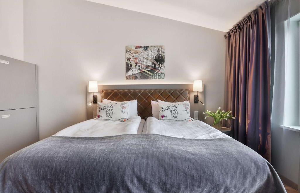 Postel nebo postele na pokoji v ubytování Scandic Stora Hotellet