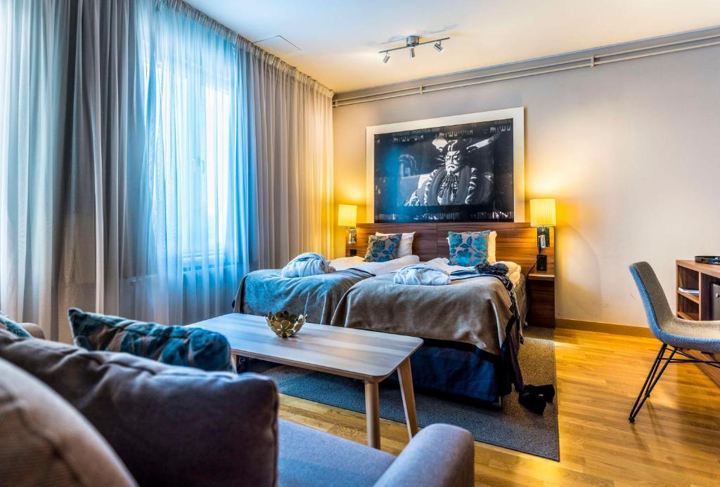 Postel nebo postele na pokoji v ubytování Scandic Stora Hotellet