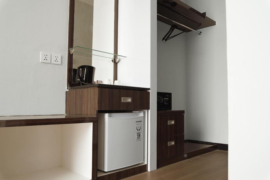 Kuchyň nebo kuchyňský kout v ubytování Dreamtel Jakarta