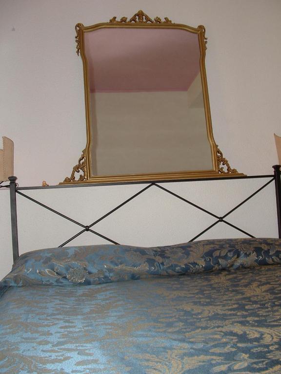 Letto o letti in una camera di Agriturismo Pian dei Pini