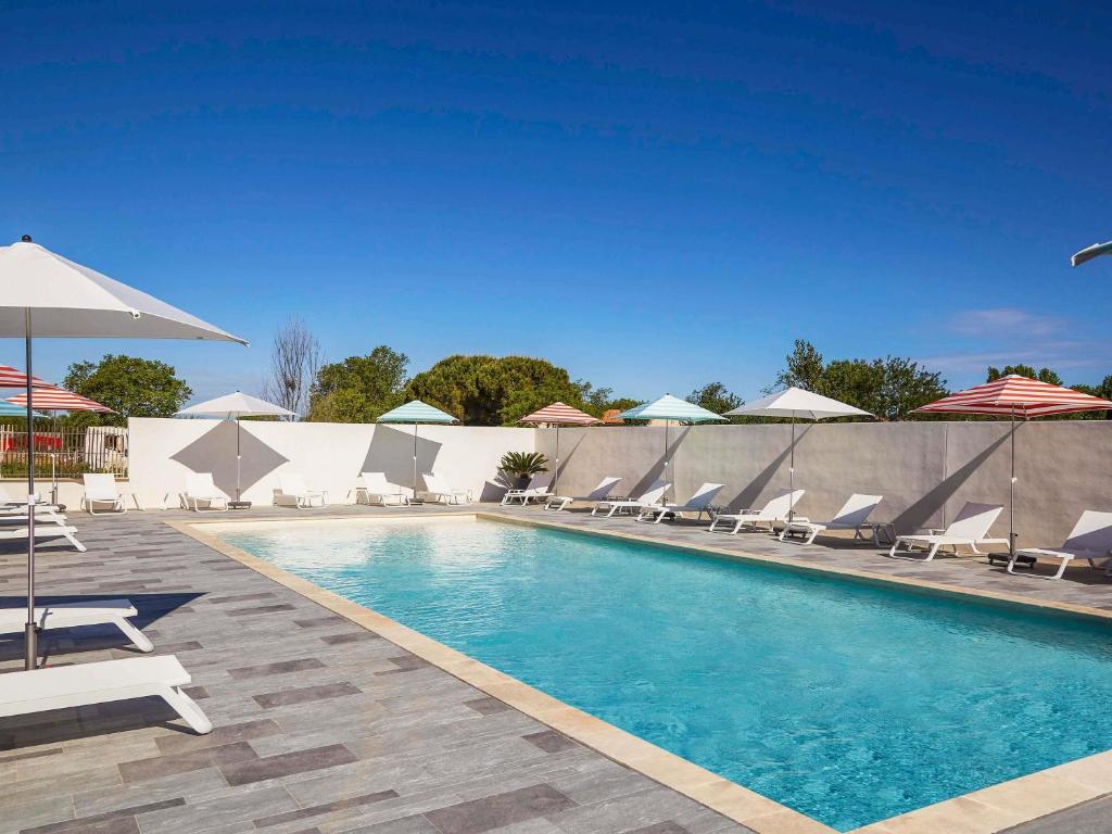 Bazén v ubytování Ibis Styles Montpellier Aéroport Parc Des Expos nebo v jeho okolí