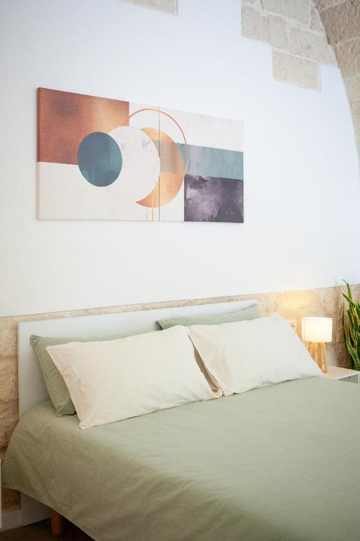 Postel nebo postele na pokoji v ubytování Casa Tonì