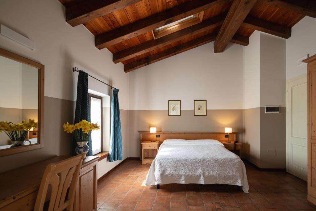 Łóżko lub łóżka w pokoju w obiekcie Agriturismo Mulino Delle Tolle