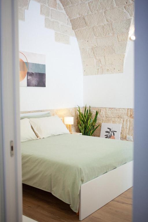 Postel nebo postele na pokoji v ubytování Casa Tonì