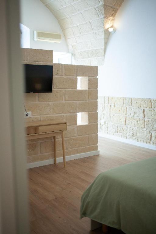 TV a/nebo společenská místnost v ubytování Casa Tonì