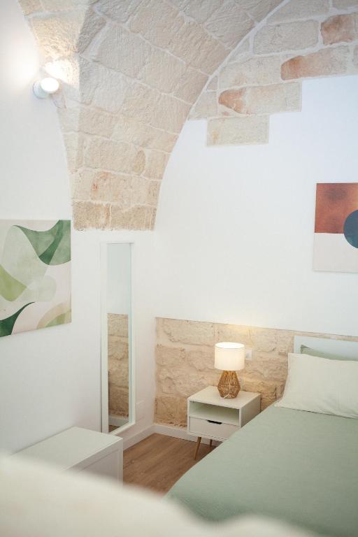 Postel nebo postele na pokoji v ubytování Casa Tonì