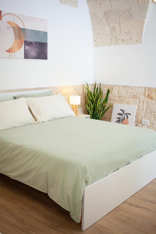 Postel nebo postele na pokoji v ubytování Casa Tonì
