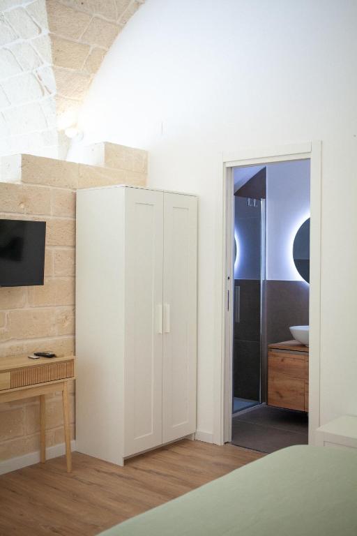 Postel nebo postele na pokoji v ubytování Casa Tonì