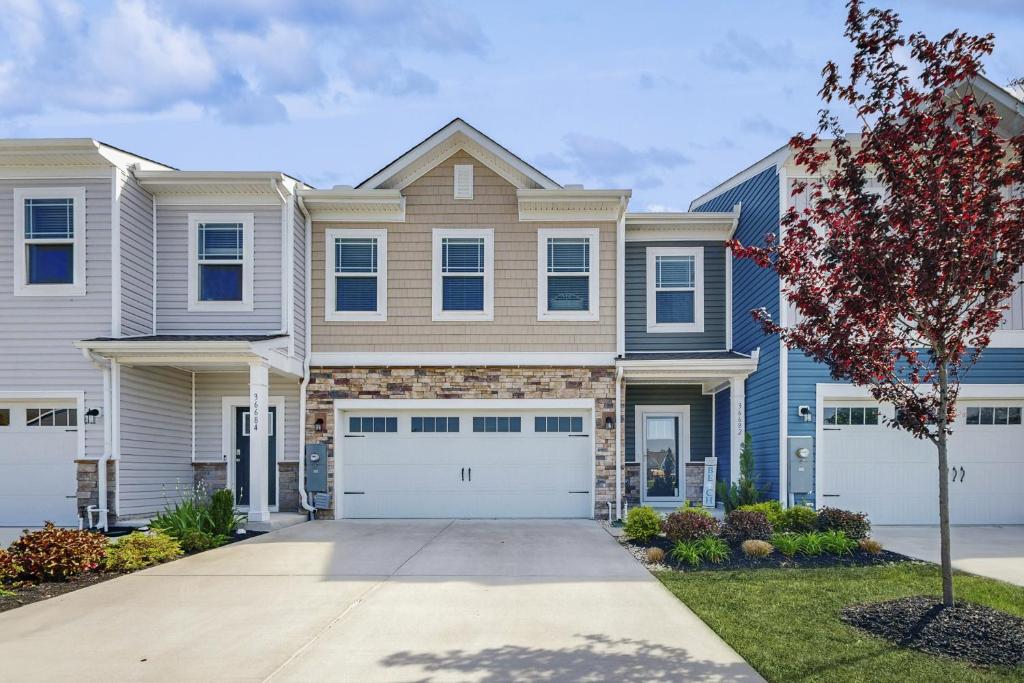 a large house with a garage at Millville by the Sea --- 36682 Calm Water Dr in Millville