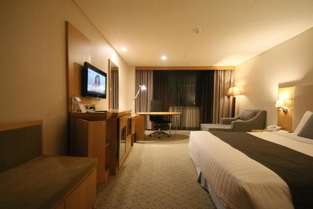 TV a/nebo společenská místnost v ubytování Ramada by Wyndham Songdo
