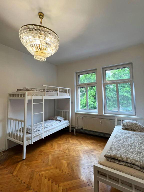 Postel nebo postele na pokoji v ubytování Rooms Miklošičeva