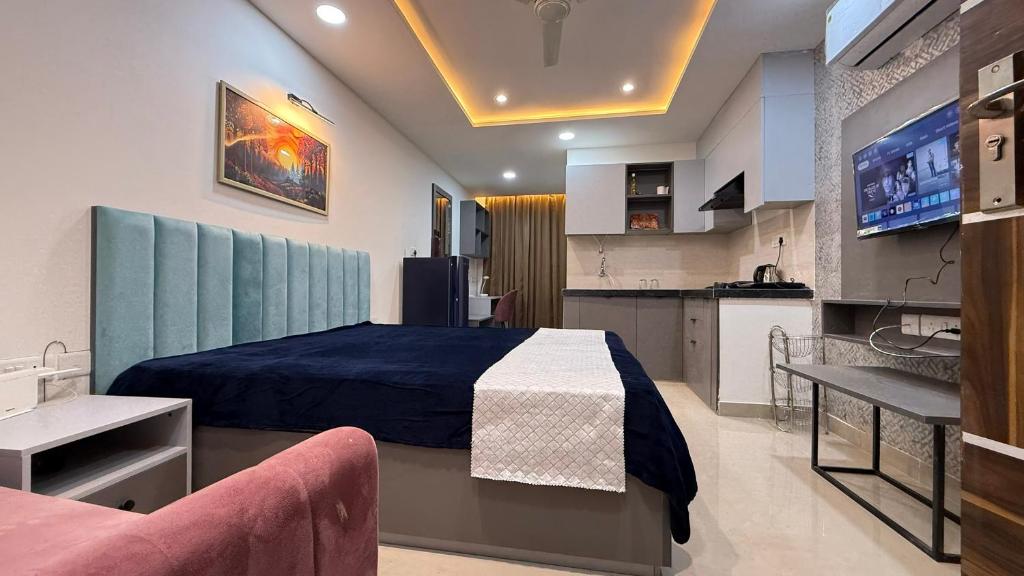 TV at/o entertainment center sa 10th floor Well Design Luxury Studio in Jaipur