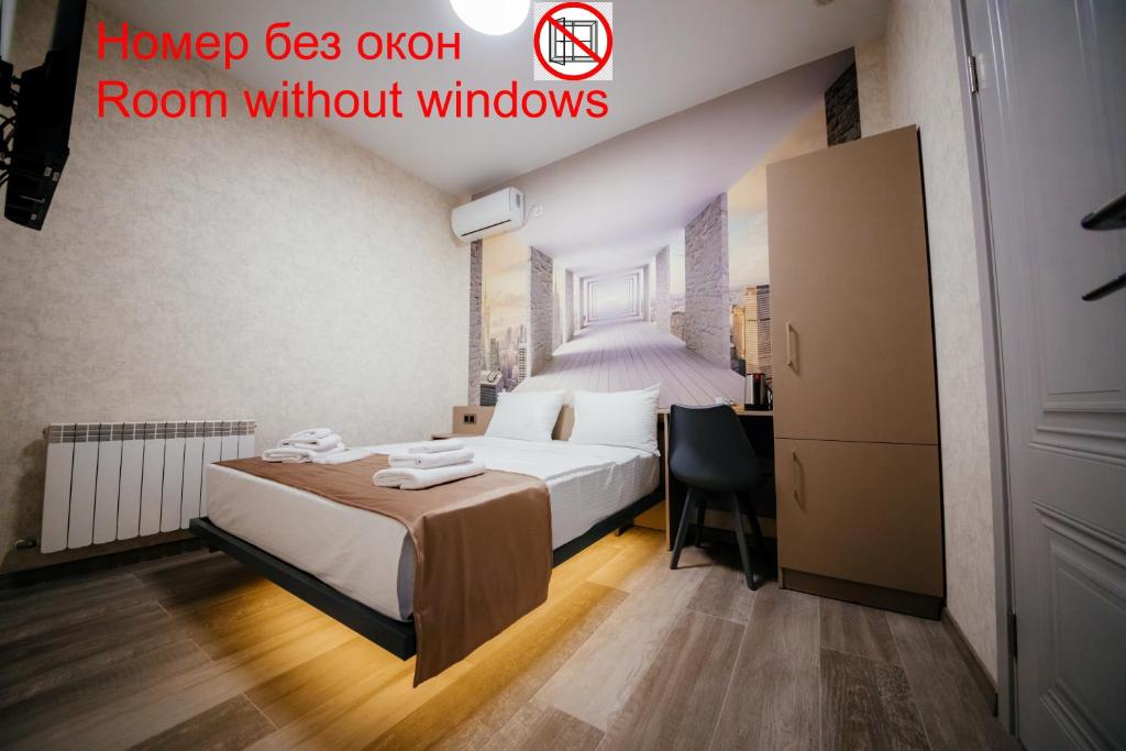 Postel nebo postele na pokoji v ubytování Chief Hotel